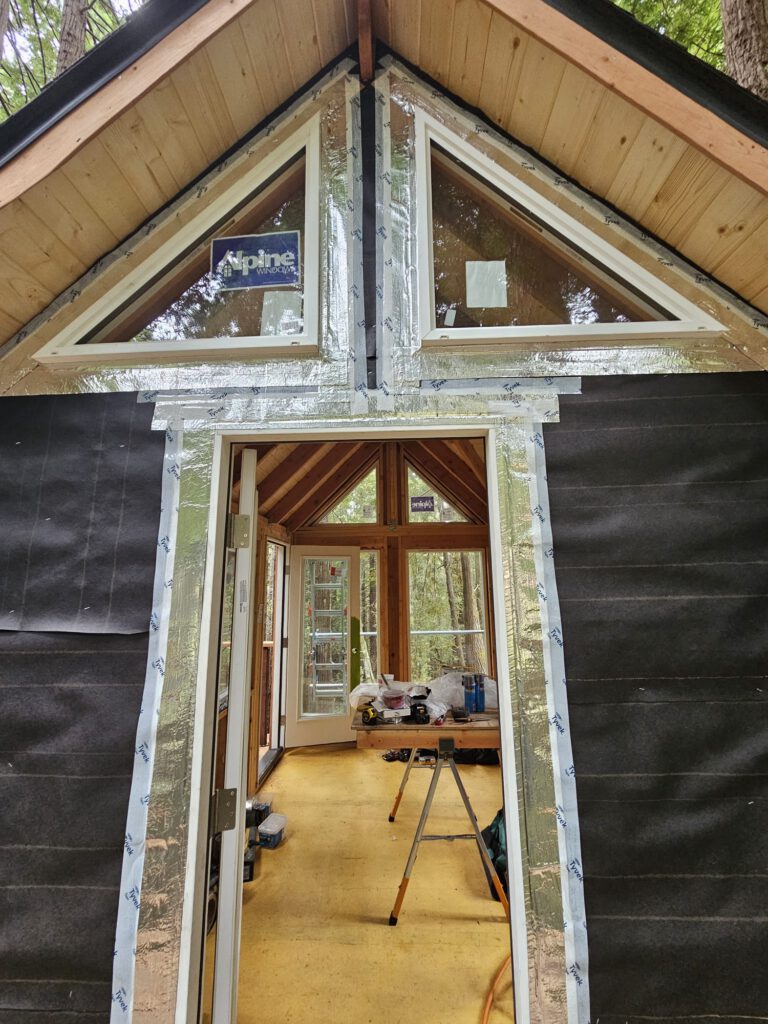 More windows, flashing done